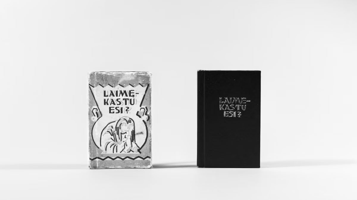 Two black and white book covers standing upright on a plain white background.